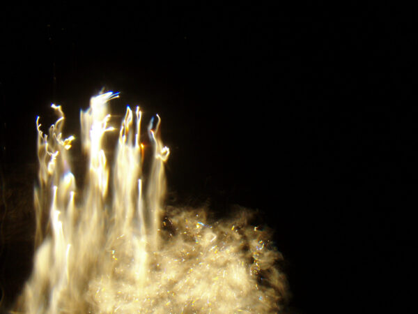 Underwater photo of white fireworks