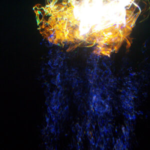 Blue and gold photo of fireworks under water
