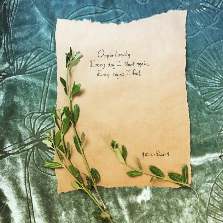 Haiku Written on brown paper with olive branches